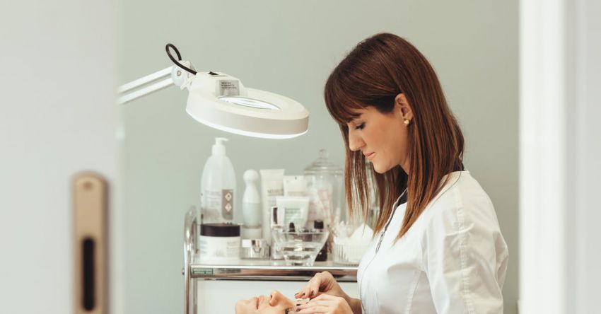 Procedures - Beautician Making Facial Beauty Procedures for Woman in Salon