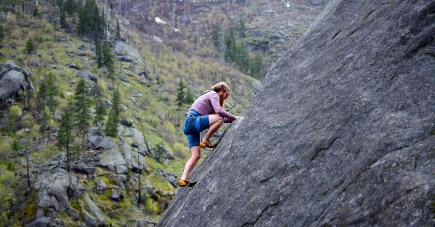 Challenges - Man Climbing on Rock Mountain