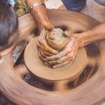 Experience - Person Making Clay Pot in Front of Girl during Daytime